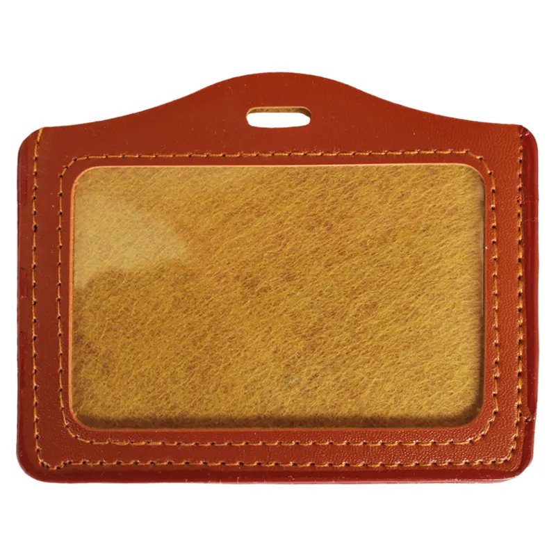 Բեյջ դերմանտինից և պոլիպրոպիլենե թաղանթով երեսային մասում, վերևից ամրացման անցքով։ Չափերը՝ 102 * 73 մմ: Սեղմակի փոխարեն կարող է նաև օգտագործվել բեյջի լար